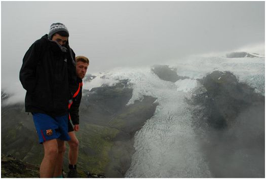 Lewis & Alex being brave in shorts looking out over Virkisjokull & Falljokull